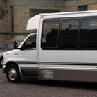Private Transfer from PET Montréal Airport to Downtown Montréal with a 21 passagers mini-coach