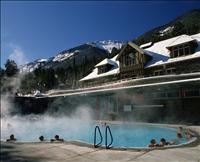 GALLERY-BUHS-Few guests soaking in pool with old b